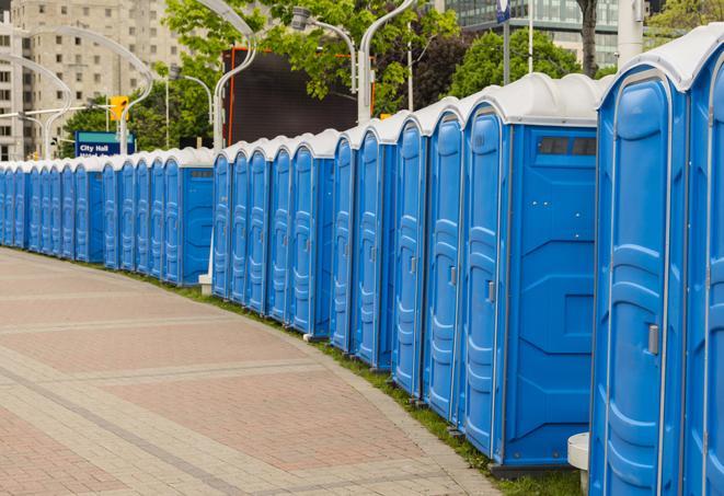 a line of brightly-colored portable restrooms, perfect for outdoor festivals and concerts in Berkeley